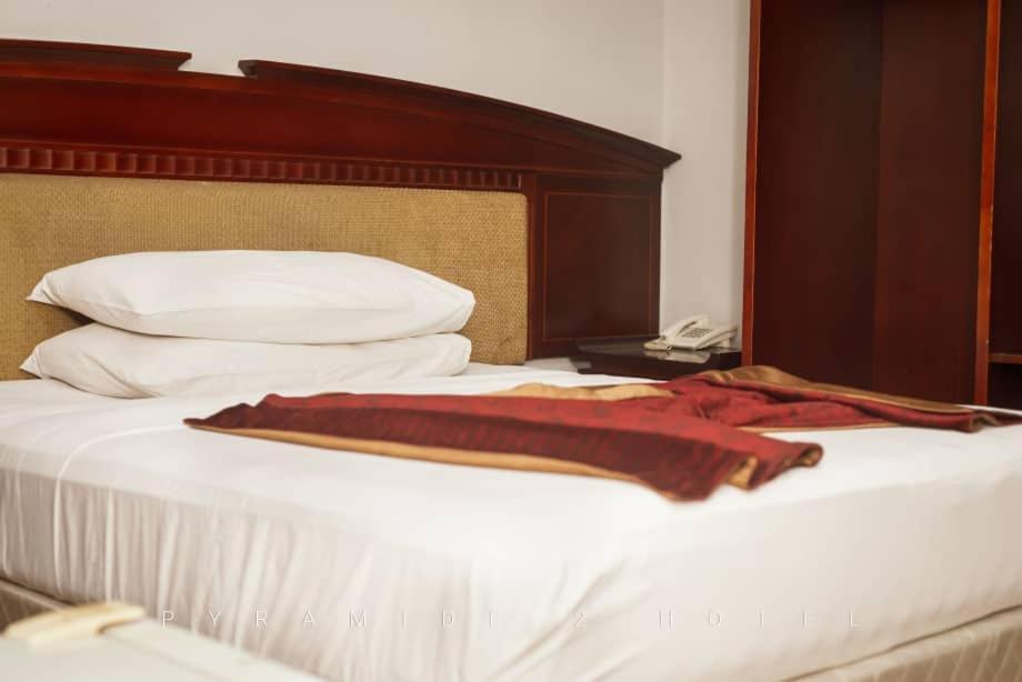 Pyramide II Hotel คินชาซา ภายนอก รูปภาพ